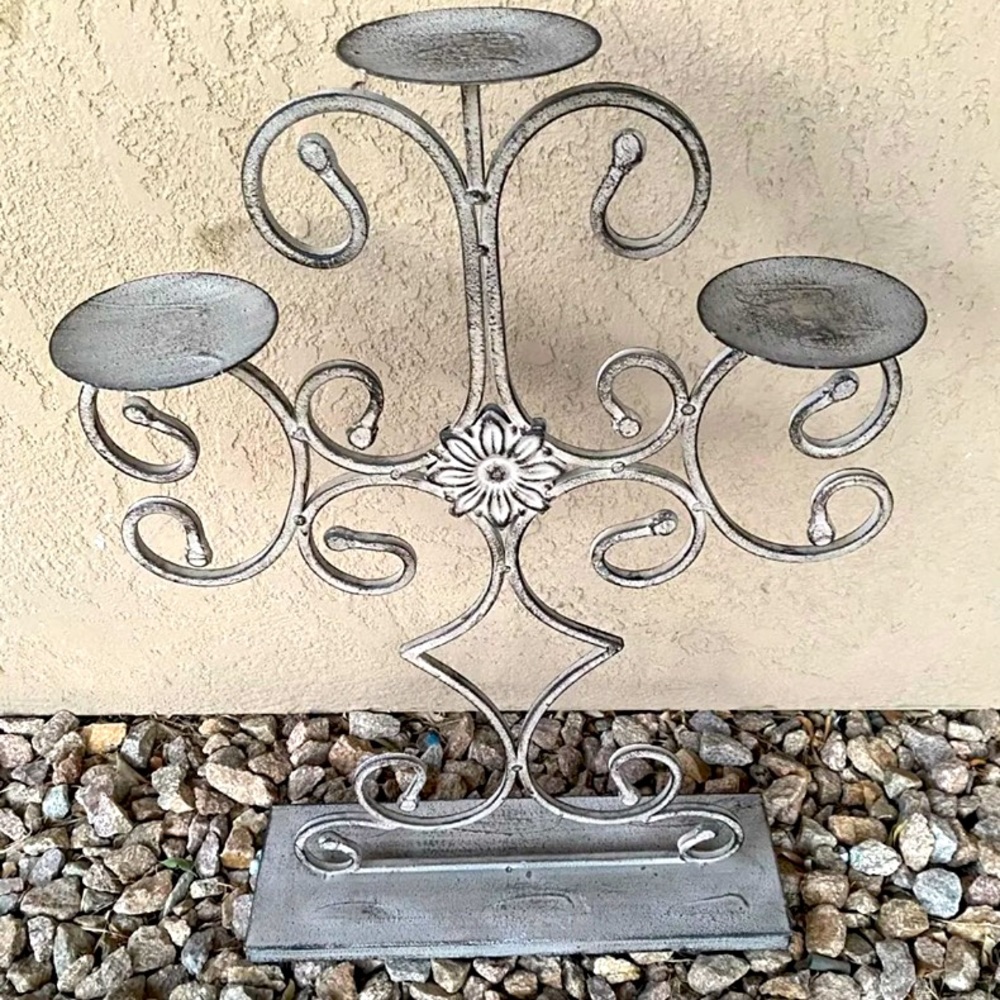 Scrolled metal 3 part candle holder with base. New